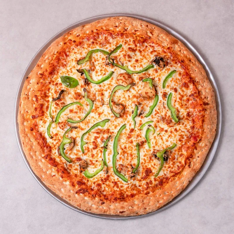 Cheese pizza topped with fresh green peppers from Pizza Expresso in NDG, Montréal