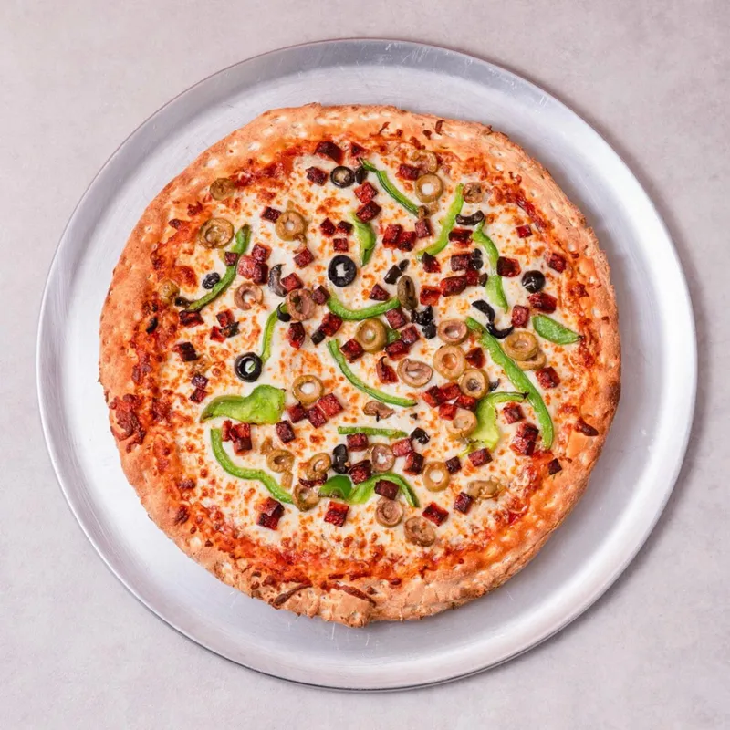 Toute garnie all-dressed pizza with pepperoni, mushrooms, green peppers and black olives